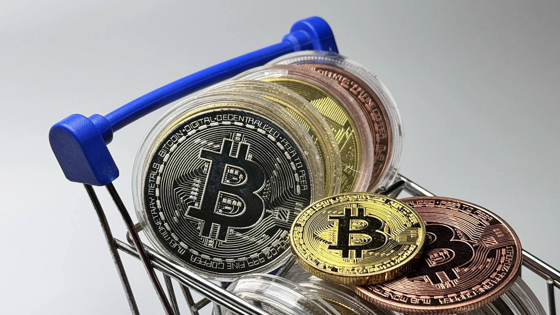 Bitcoin in a shopping cart.